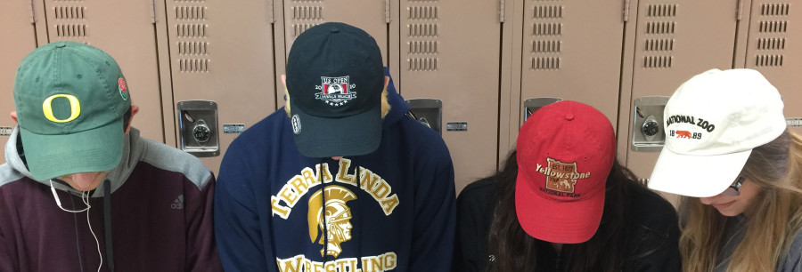 TL students display their dad hats
