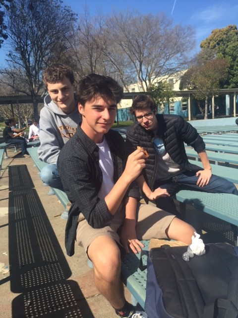Junior Parker Benjamin sitting with his friends at lunch. 